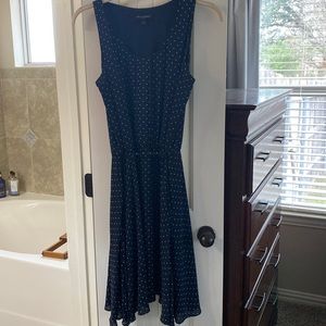 Navy and white polka dot sleeveless dress